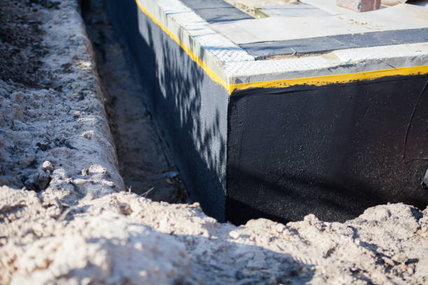 Professional Emergency Waterproofing technician working in Colfax, WI